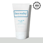 White two ounce bottle of Face Reality Daily SPF Lotion with ASCP Skin Deep 2022 Readers Choice Awards Stamp  - view 1