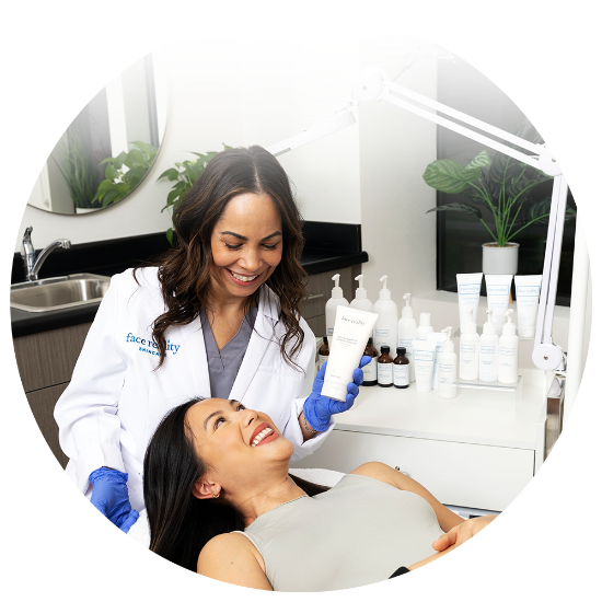 Acne Expert with Client during treatment session