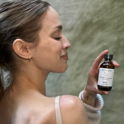 Acne Expert Holding Face Reality Acne Peel