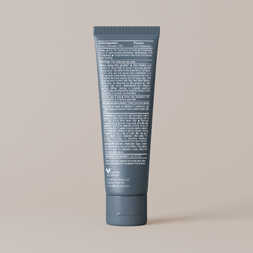 Blue tube with text on a beige background
