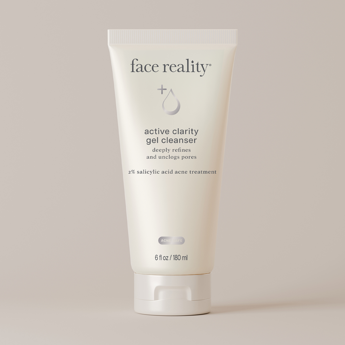 Face Reality active clarity gel cleanser tube against a light beige background